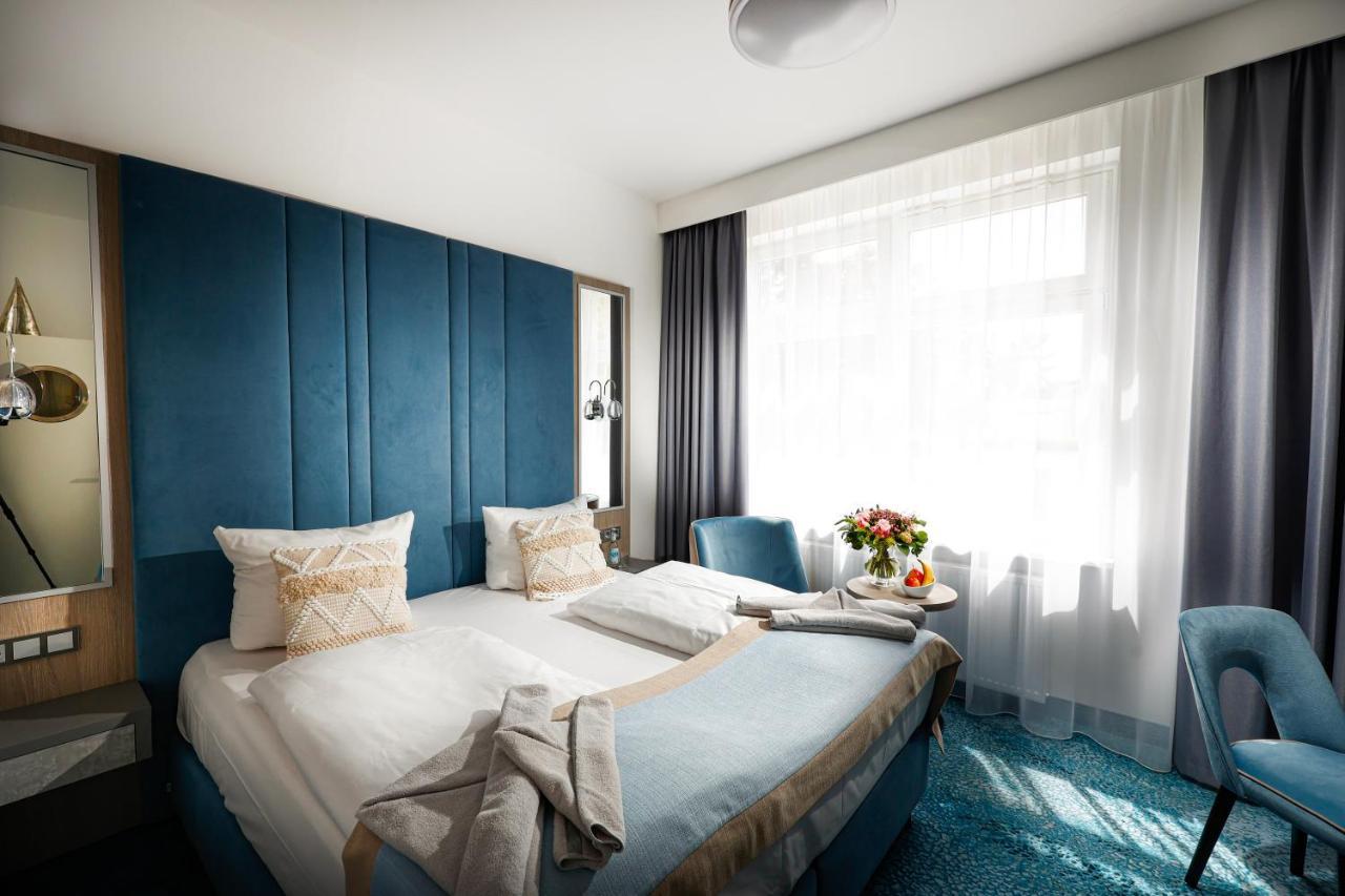 Hotel Leuchtturm Тиммендорфер-Штранд Экстерьер фото