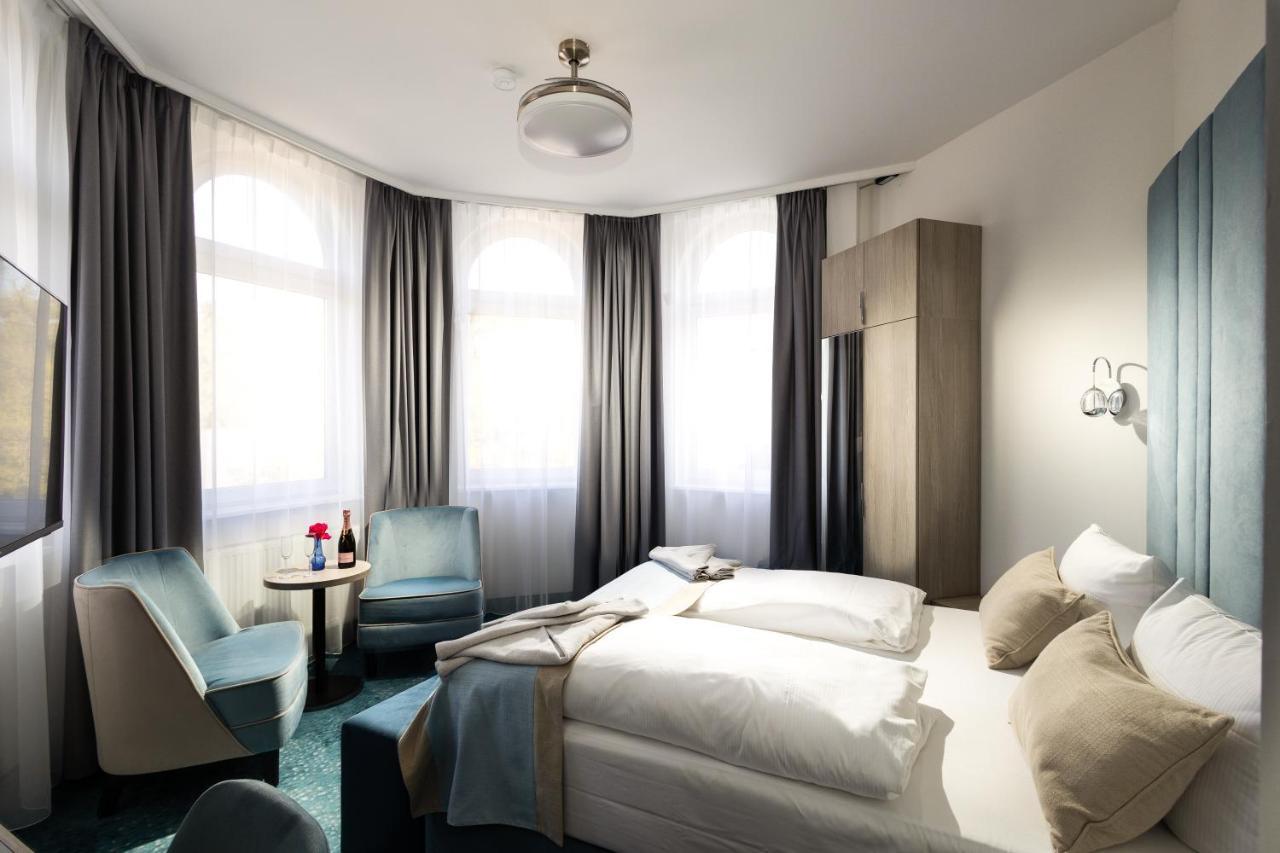 Hotel Leuchtturm Тиммендорфер-Штранд Экстерьер фото